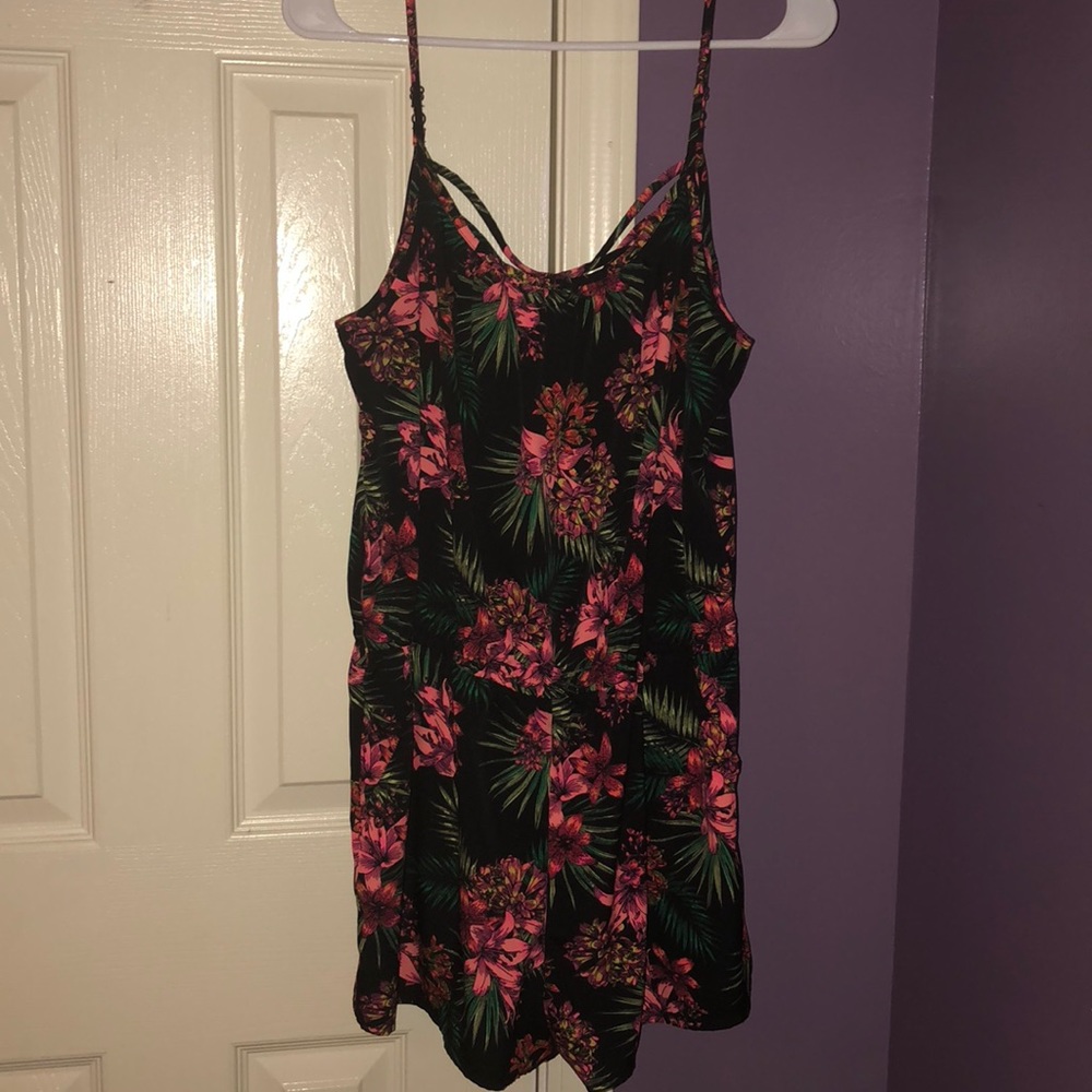 Flowered romper with a lace up back at the top